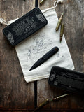 G10 Black with Coyote Accent Lanyard  Thumb Dagger - Version 1